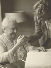 Helen Keller with Nella Braddy Henney finger spelling to her, n.d. 