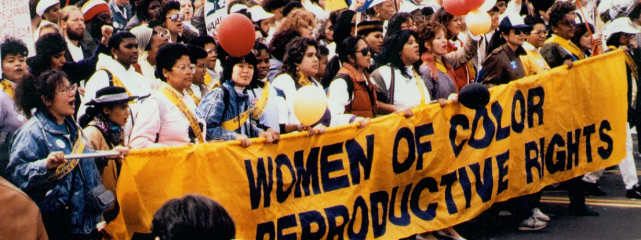Archival photo of women marching for reproductive rights