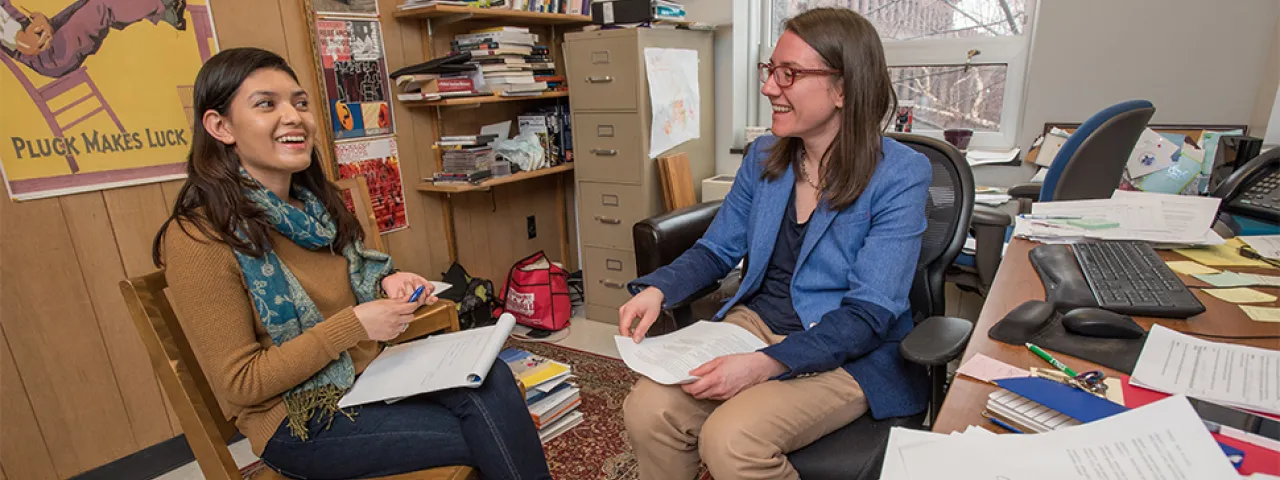 Tina Wildhagen meeting with a student in her office