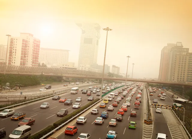 Crowded and smoggy highway in a Chinese city