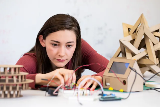 Karena Garcia working with objects in a lab