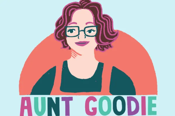 Illustration of a person with pink/brown wavy hair and teal square glasses