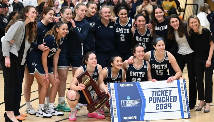 The Smith basketball team after defeating Bowdoin during the NCAA championship tournament