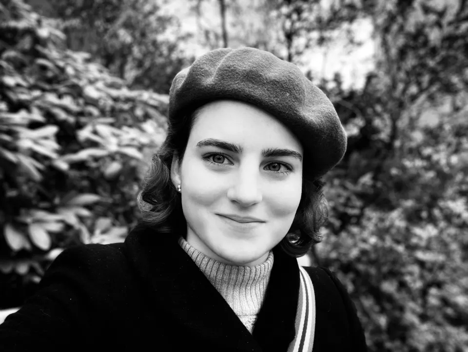  Emma Agudelo ‘24 in baret in black and white